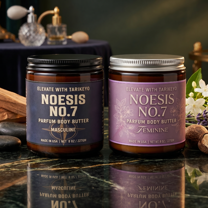 Two jars of Elevate With Tarikeyo No. 7 Parfum Body Butter are displayed side-by-side on a polished black marble surface.
